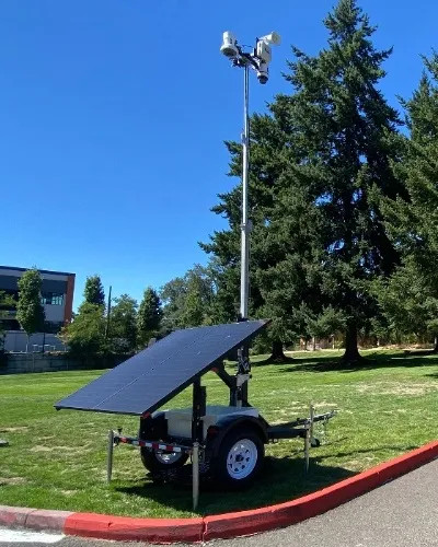 Surveillance Trailer by a Parking Lot - Thumb