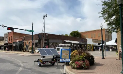 Blog Thumbnail Wide Trailer on the street corner helping law enforcement at an Oktoberfest Event