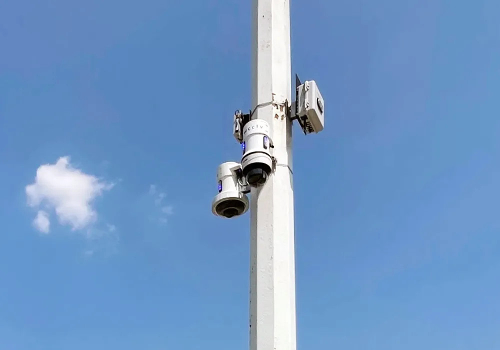 Two Law Enforcement Pole Cameras