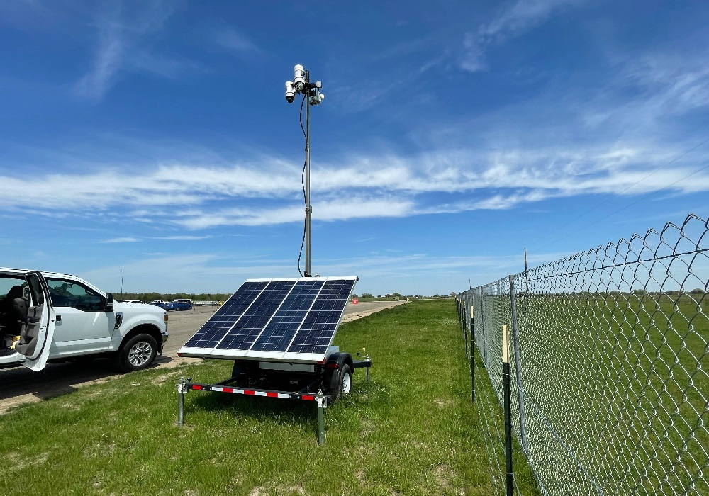 Solar Surveillance Trailer by Fence - Header