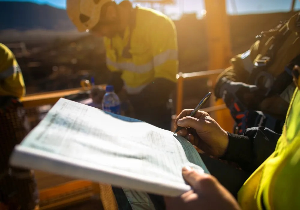 Construction Workers Writing - Header