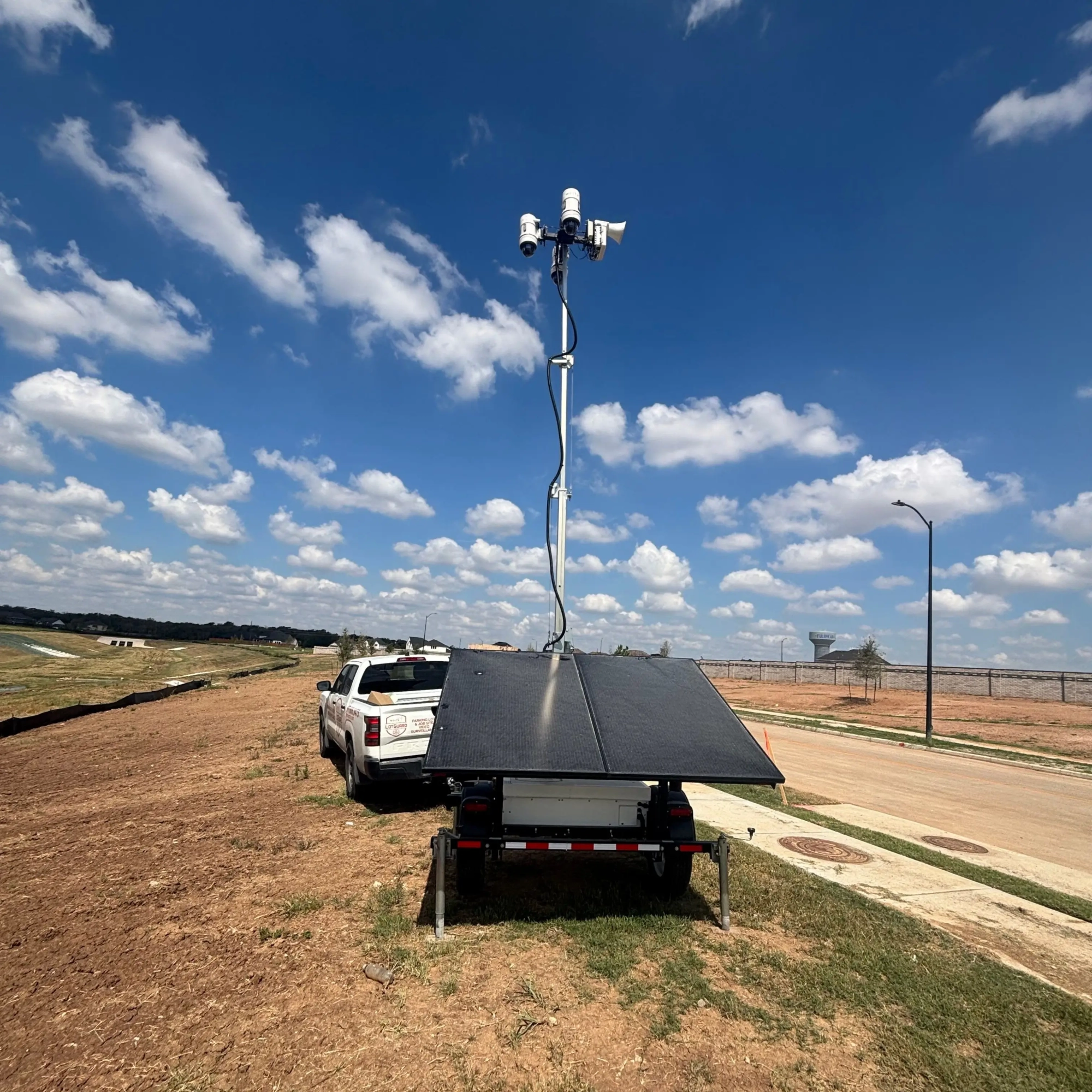 New style Solar Surveillance Trailer next to road